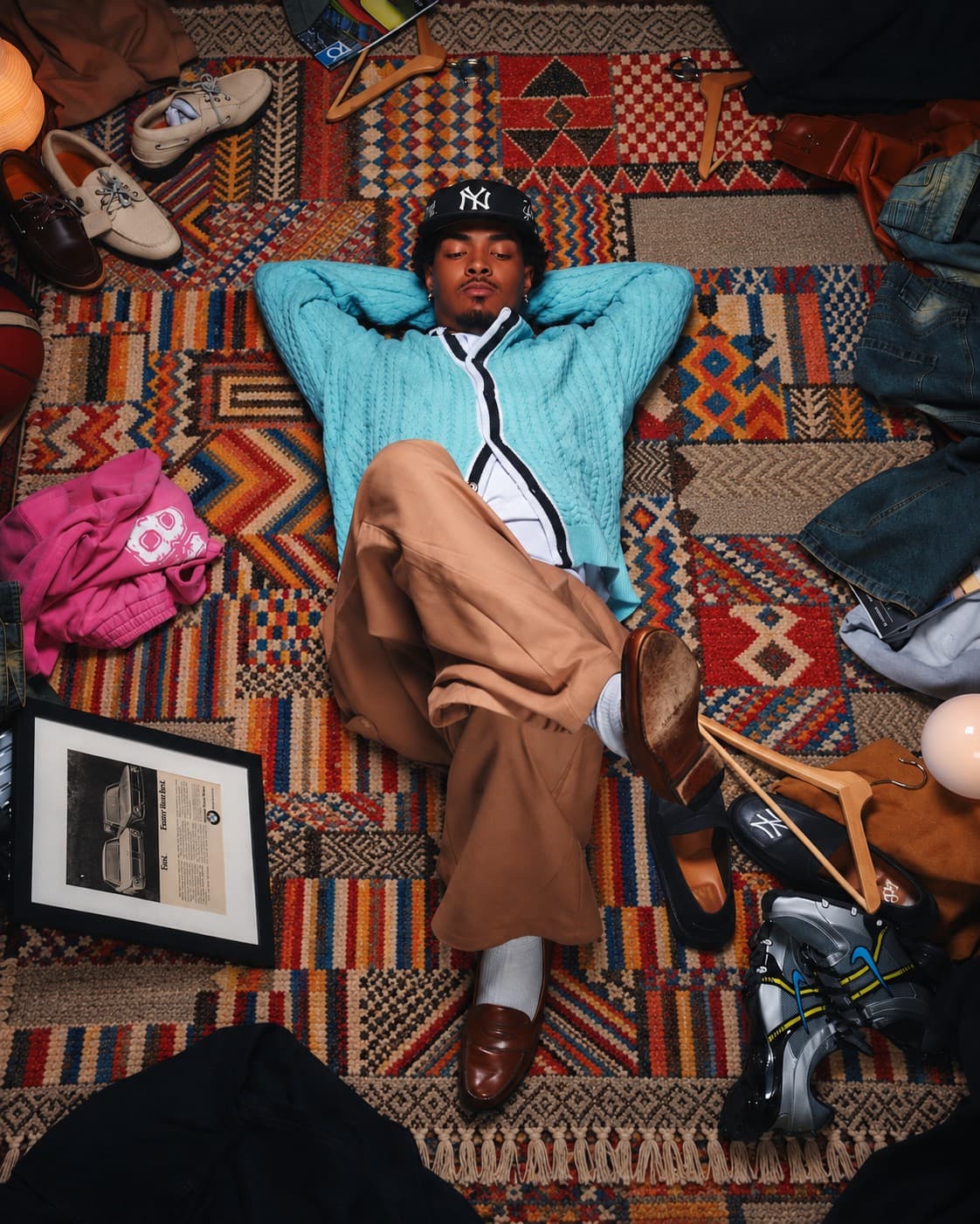Lying on a patchwork Amazigh carpet